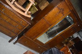 An early 20th Century oak three piece bedroom suite