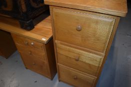 A Scandinavian home office desk and filing cabinet, by Treske , in golden oak finish