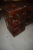 Am Edwardian mahogany and inlaid revolving bookcase