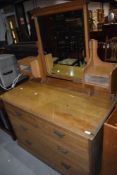 A Victorian dressing chest of two over two drawers in the aesthetic style