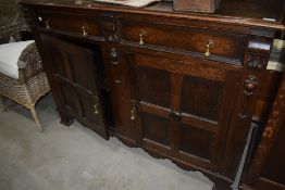 An early 20th Century oak sideboard base