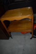 An early 20th Century golden oak tea trolley