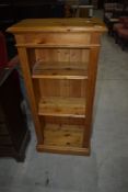 A modern pine narrow bookshelf, width approx. 50cm, height 108cm