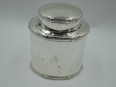 An Edwardian silver travelling tea caddy of plain form having reed and cross border, Birmingham