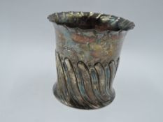 A Victorian silver beaker style vase/container having gadrooned decoration and frilled rim,