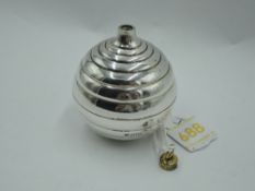 A Stuart Devlin 1984 silver Christmas tree bauble having ridged decoration and lift off cover