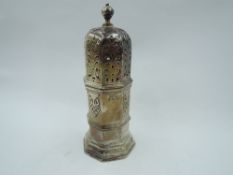 A silver sugar caster of light house form having applique and pierced decoration, Birmingham 1931,