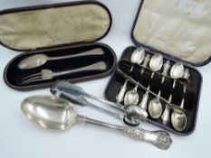 A selection of HM silver including a cased set of six silver teaspoons with a matching pair of sugar