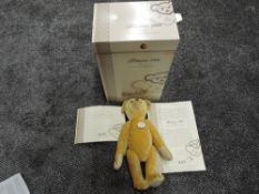 A modern limited edition Steiff Teddybear 1908 replica, height 35cm having white tag 406751, with