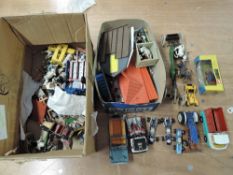 A collection of Britains and similar Farm Related Vehicles, Animals and Accessories along with a
