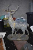 A cast alloy deer, standing