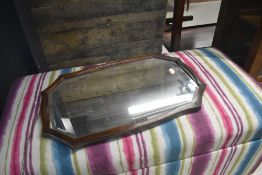 An early 20th Century oak wall mirror having shaped frame approx. 61 x 38cm
