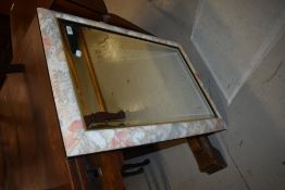 A modern floral wall mirror