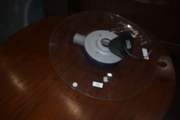 A modern perspex ceiling light fitting
