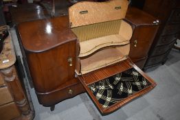 A vintage walnut cocktail cabinet , Beautility or similar