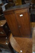 An Arts and Crafts dark oak cabinet, dimensions approx. 39 x 30 x 52cm