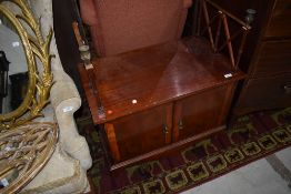 A reproduction regency side cabinet, with missing upper shelf
