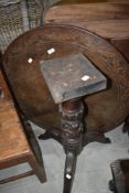 A 19th Century pedestal table having later alterations and adaptations including drop leaf
