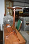 A traditional mahogany wine table