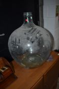 A large glass carboy