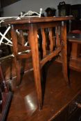 An Arts and Crafts style occasional table or plant stand