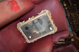 A vintage resin gilt effect wall mirror, approx 48 x 34cm