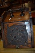 A Victorian oak coal purdonium