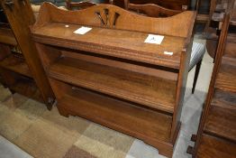 An oak Arts and Crafts bookshelf, width approx. 92cm