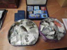 A box containing 18 GB Crowns, a tin of GB Coins half Pennies to Half Crowns no silver seen and a