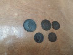 A collection of five early Irish Coins, 1805 Halfpenny, 1782 Halfpenny, 1806 Farthing, 1760 Farthing