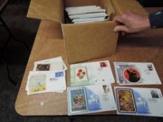A Box of First Day and Commemorative Covers, mainly large Benham Silks including Cars, Trains, Roya