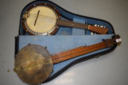 A traditional madolin banjo, probably early 20th Century , in semi hard case and a similar vintage 5