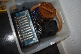 A selection of concertinas and melodeons