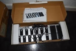 A Behringer FCB 1010 midi foot controller