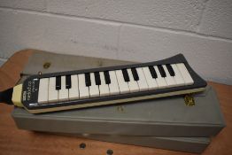 Three vintage Hohner Melodica (26/27) in vinyl cases