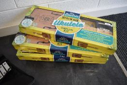 A job lot of 4 hinkler self assembly strum box, cigar box style, ukuleles