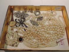 A small selection of costume jewellery including Tissot wrist watch, simulated pearls with silver