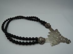 An Artisan necklace designed and made by Alan Vallis @ OXO having a double strand of black glass