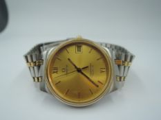 A gent's Omega Seamaster quartz wrist watch having baton numeral dial with date aperture to