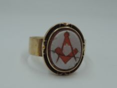 A 15ct rose gold signet ring with Freemason intaglio panel,size Q/R & approx 6.8g (AF)