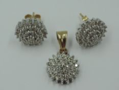 A pair of diamond cluster stud earrings, each having 37 brilliant cut diamonds in claw set in 9ct
