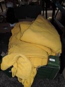 A box of vintage yellow curtains.