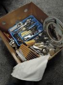 A selection of cutlery flatware and table wares