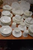 A large collection of Shelley dainty white including cups and saucers, fruit bowl, bowls, plates and