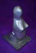A modernist style metal sculpture study of a nude figure