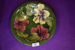 A green glaze fruit bowl by Moorcroft bearing a 70's stamp