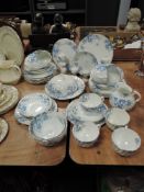 A part tea service in porcelain having blue transfer print and swirl design