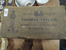A boxed set of wooden Thomas Taylor Scotch bowls having been presented by Kirkby Lonsdale bowling