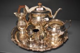 A silver plated part tea set with serving tray
