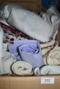 A collection of upholstery fabric some larger pieces included